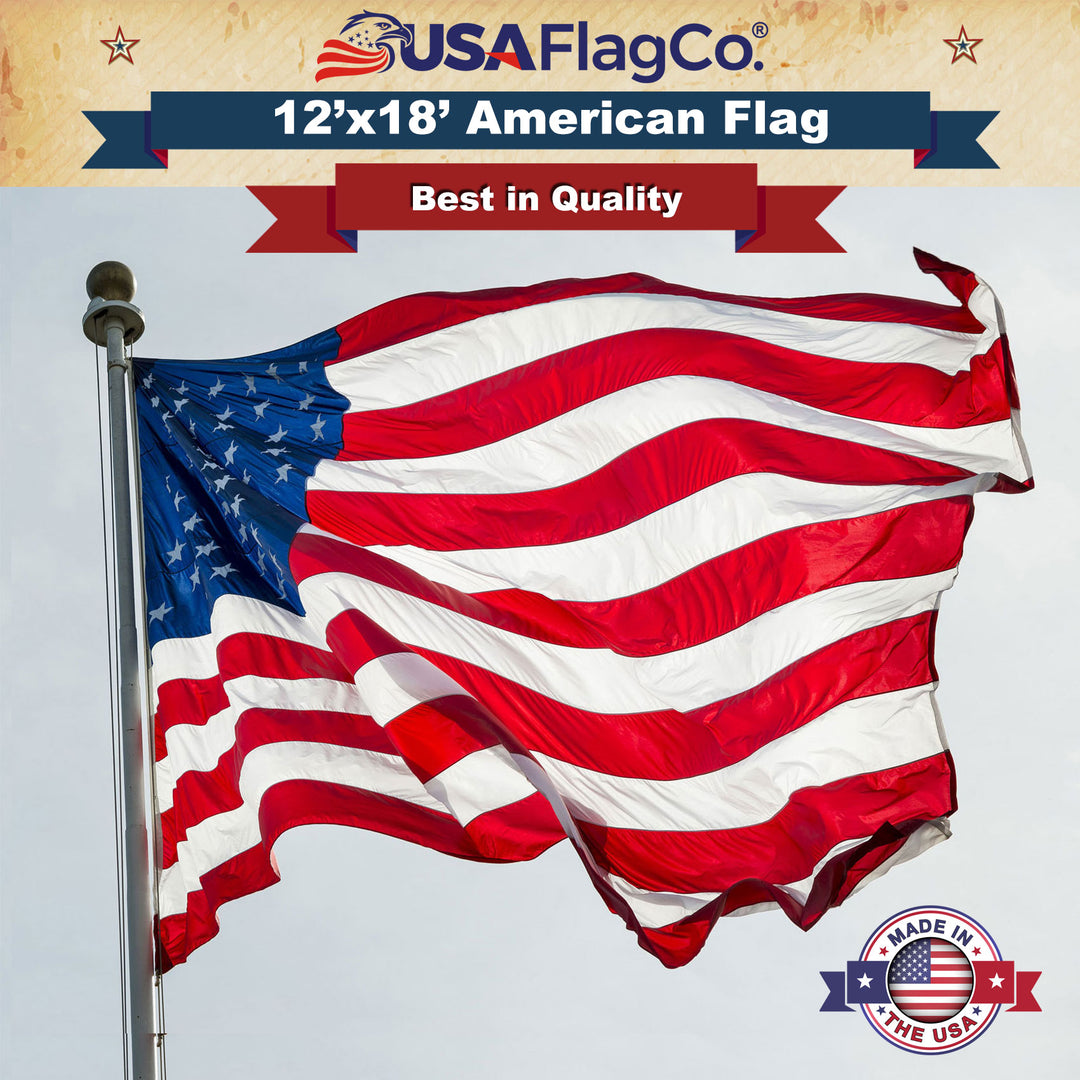 Large 12x18 ft Premium Nylon US Flag flying outdoors on a flagpole.